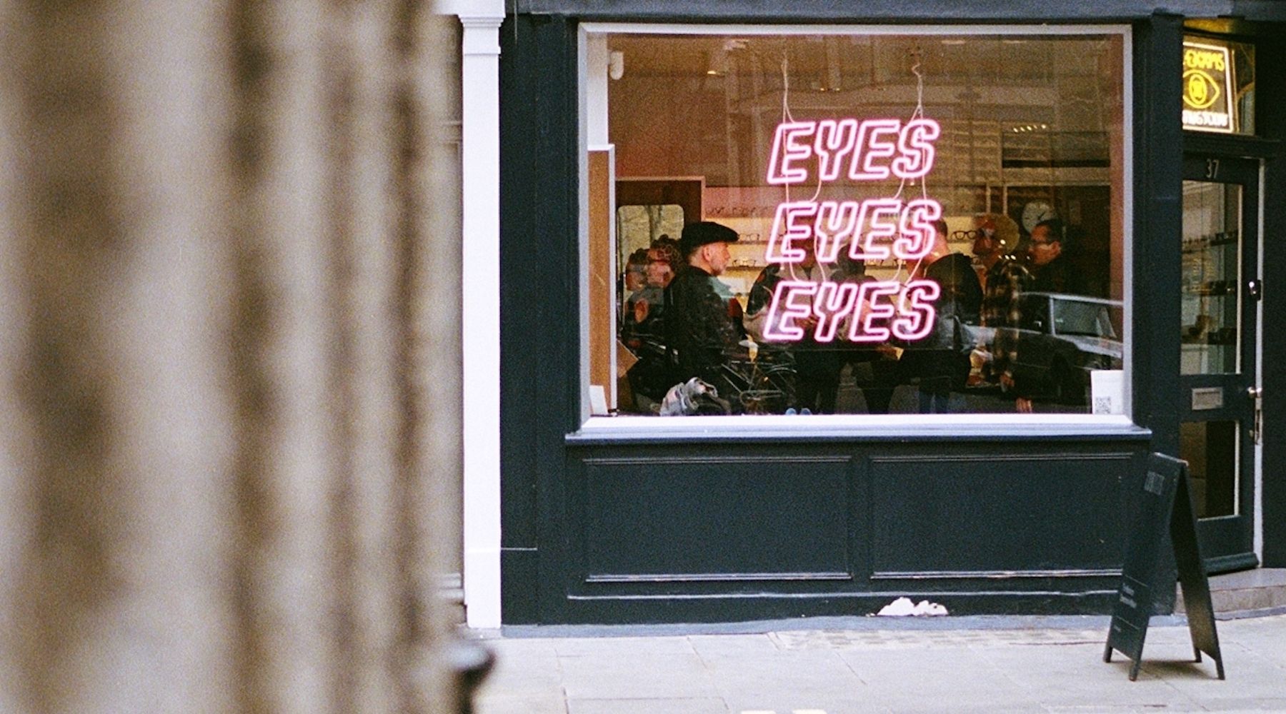 eyes eyes eyes neon sign