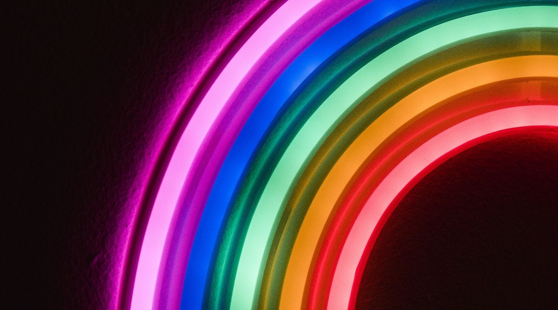 rainbow zoomed in neon sign