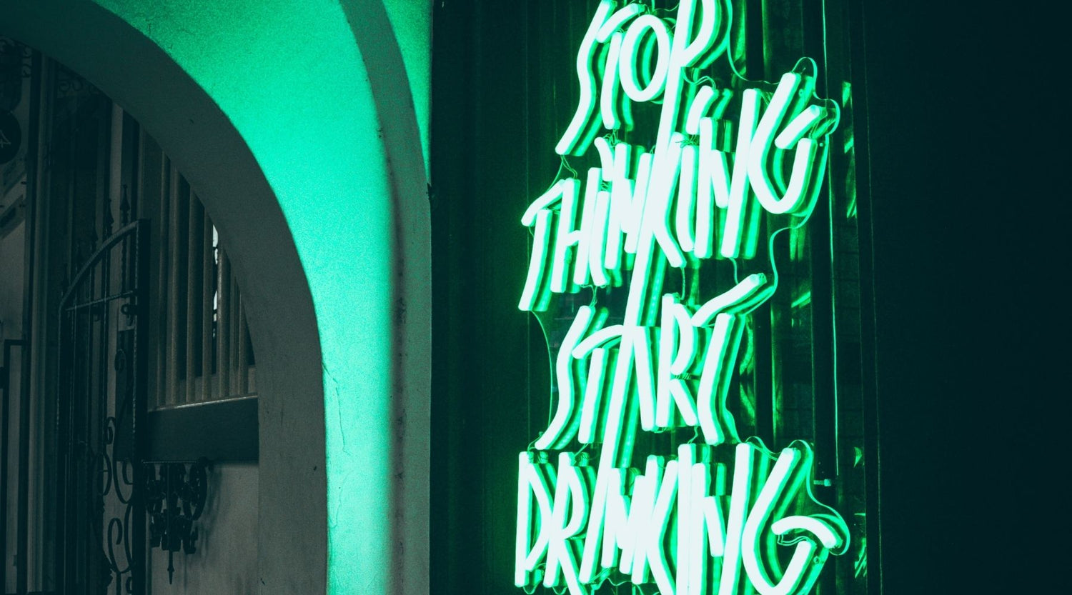 stop thinking start drinking neon sign