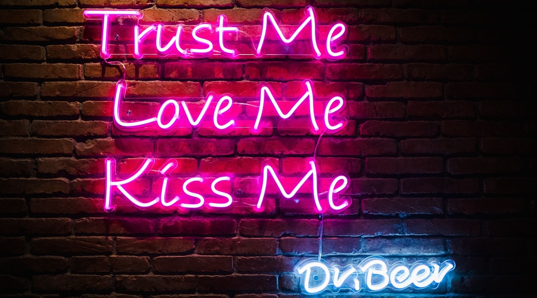 trust me love me kiss me neon sign